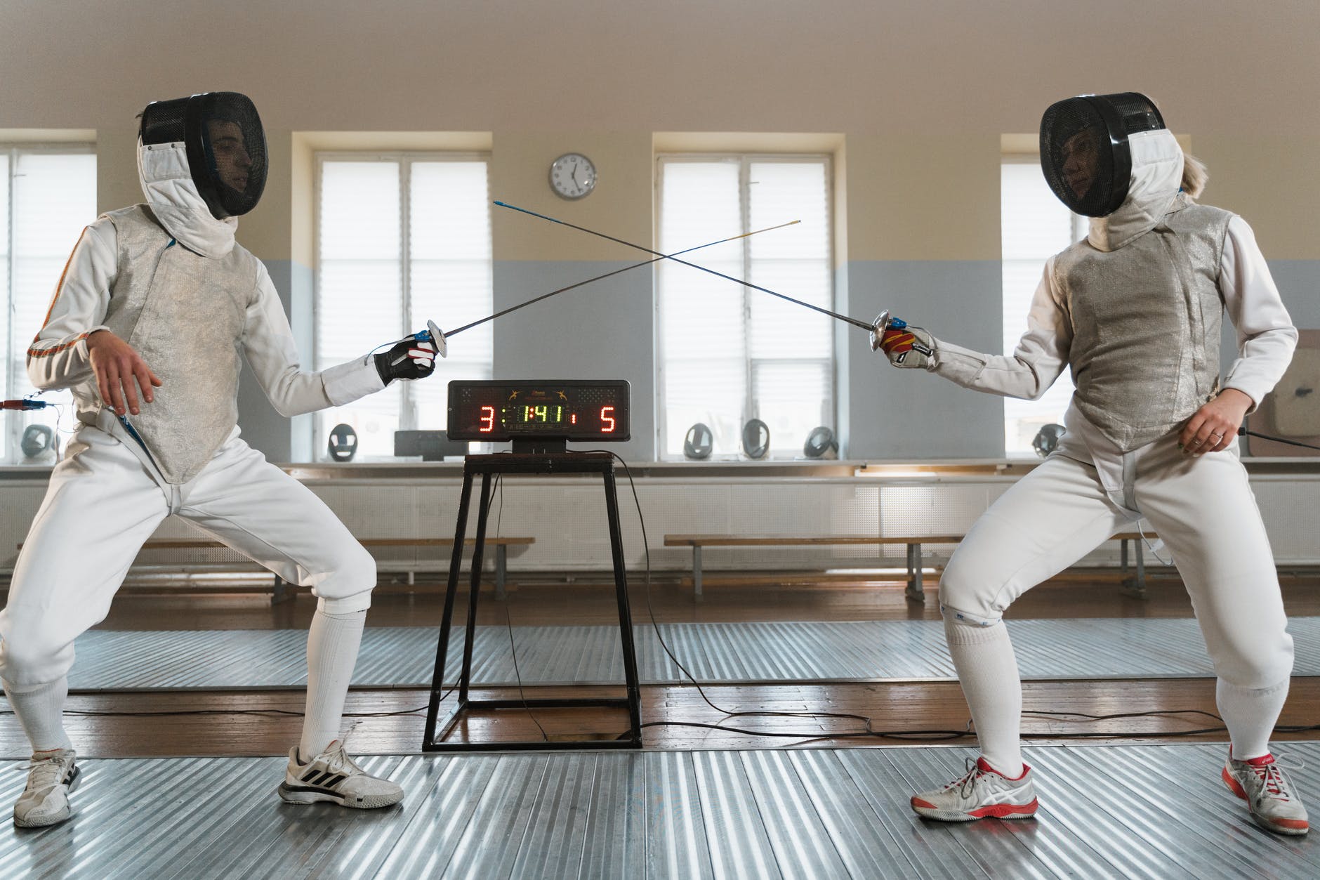 fencers in their fighting stance
