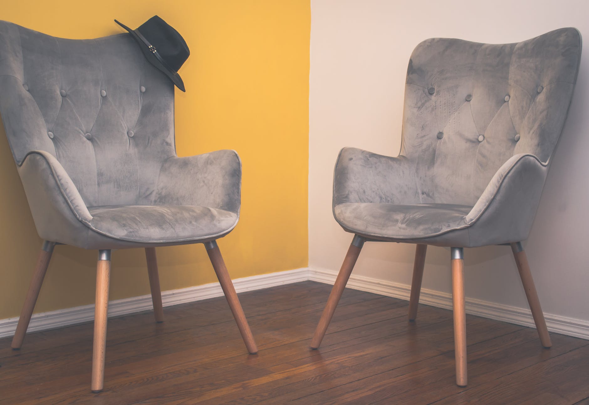 two suede armchairs